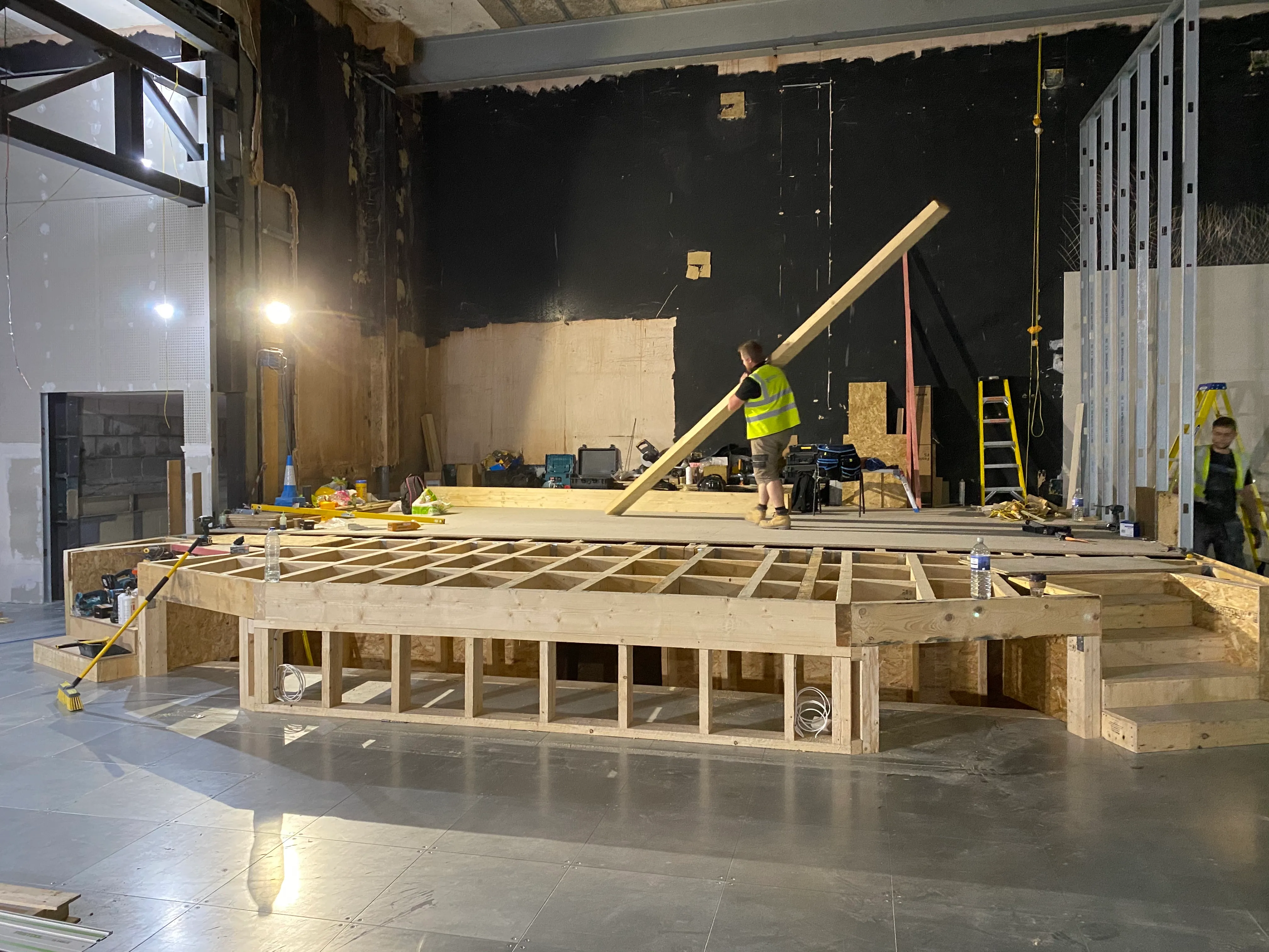 LED screen panels being mounted on the stage wall at Hope Church Ipswich